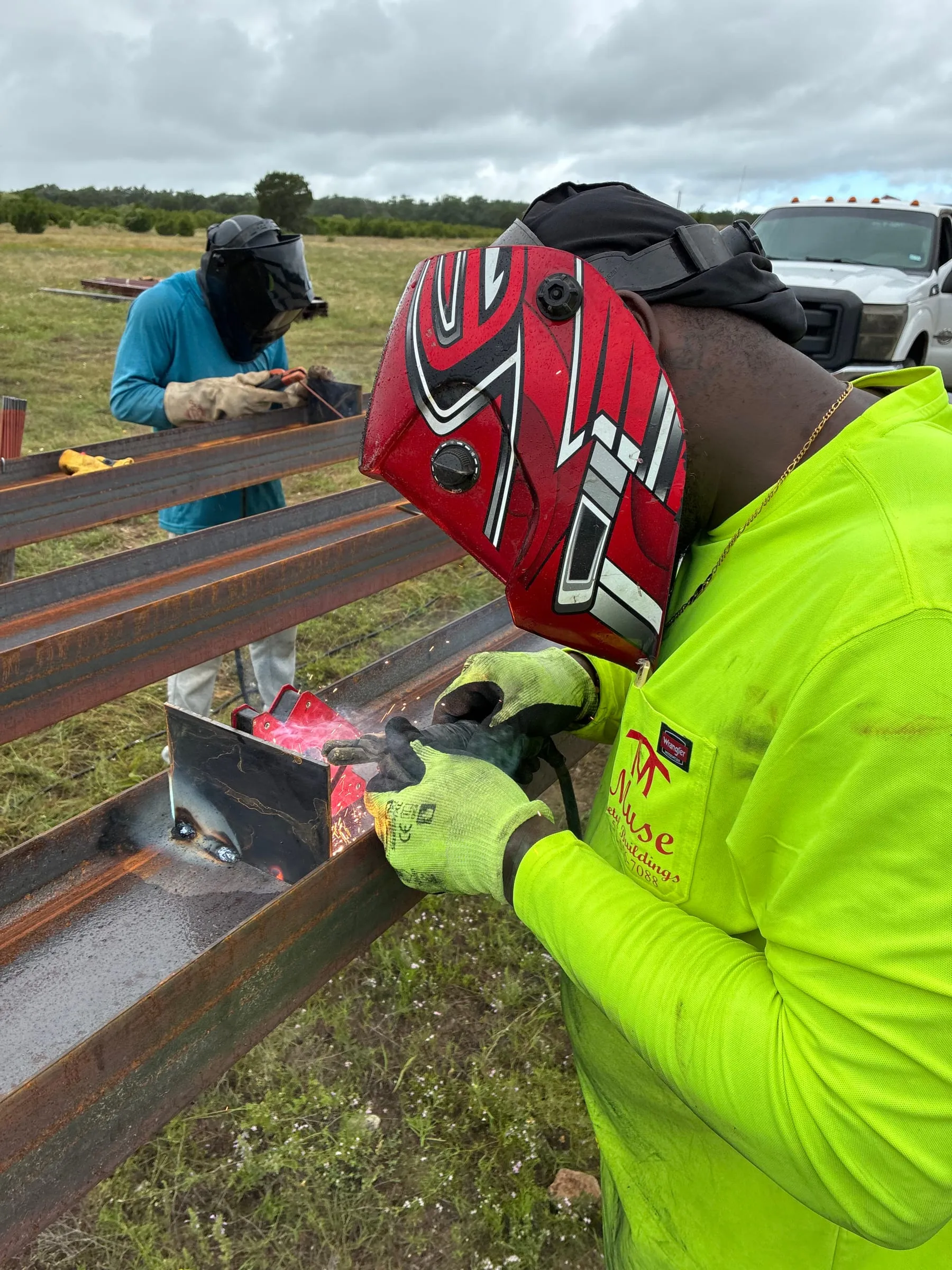 Close view of a welded bracket joining two steel frame members.